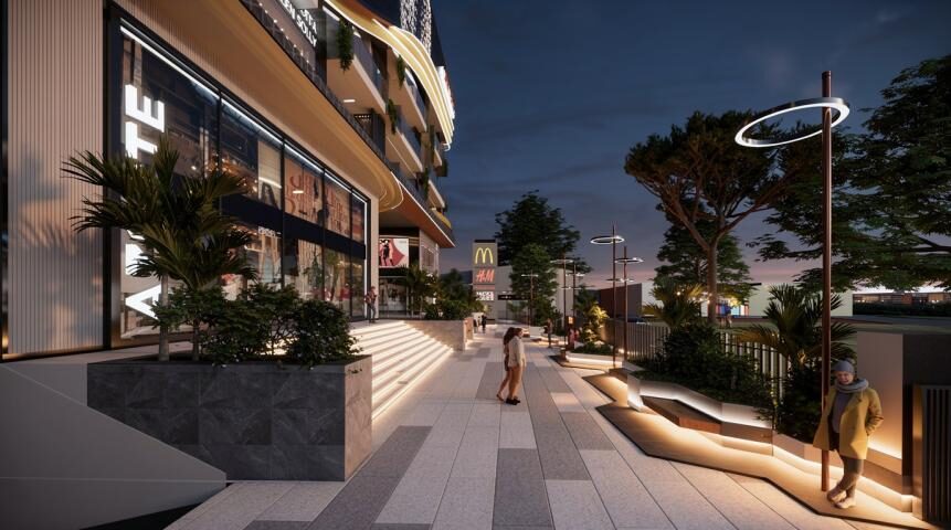 Landscaped walkway along the Ginni Estate facade